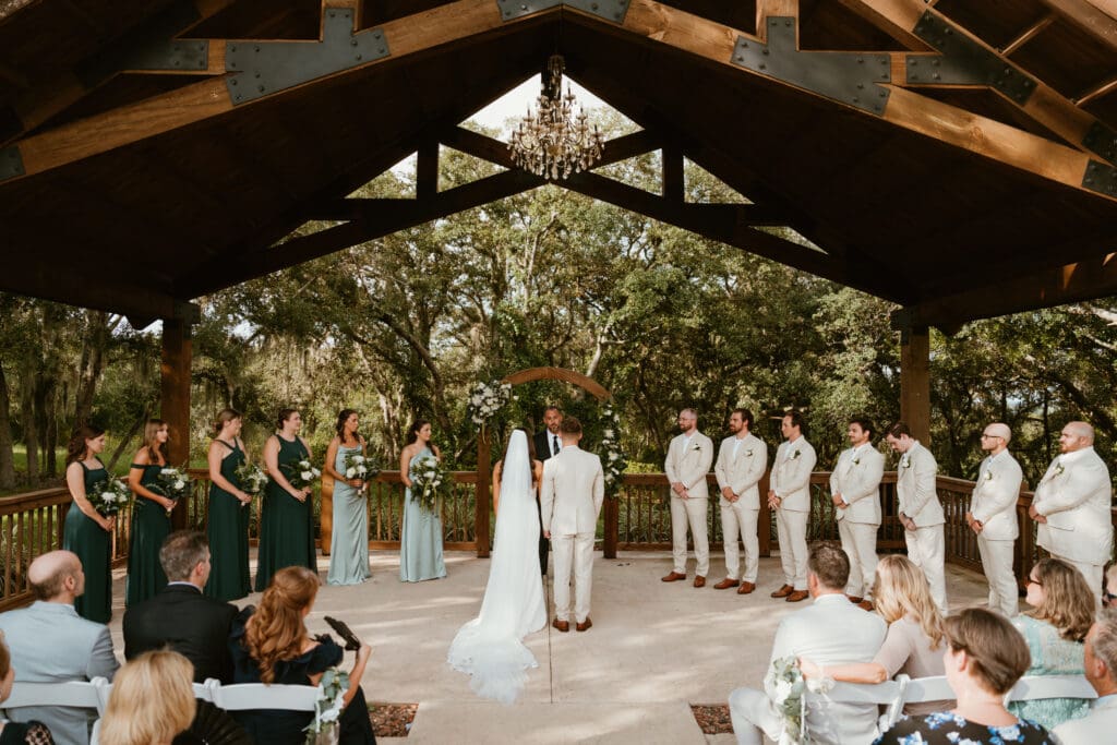 Bride walking down aisle – planned by Orlando wedding planner